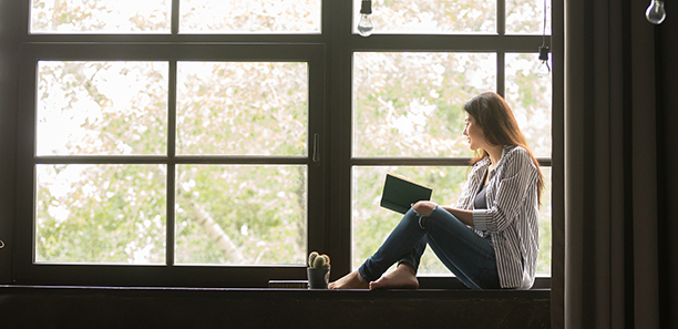 TAFE-Gippsland-Lady-reading-book-in-window