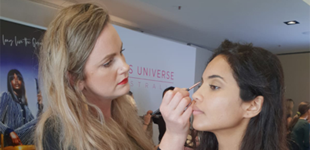 Makeup artist applying makeup