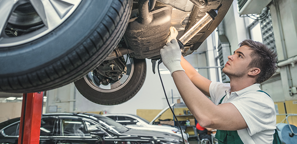 Mechanic working on car