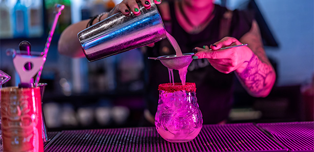 bartender mixing a cocktail