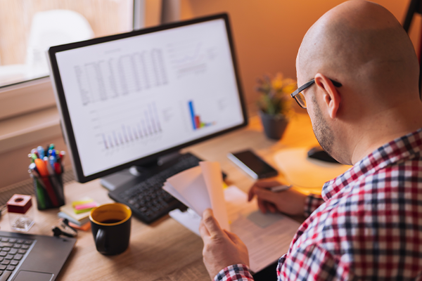 Man working on accounting documents