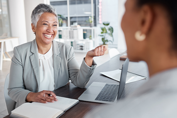 Accountant talking to her client